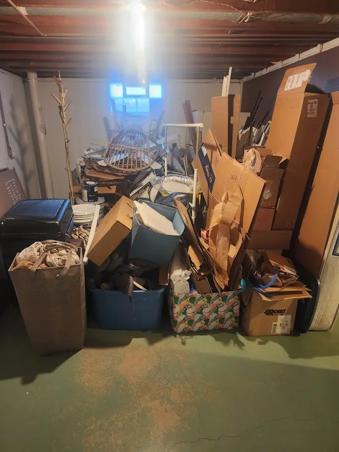 Roll-off dumpster container at job site for 15 Yard Dumpster Rental in London